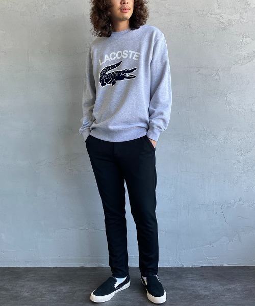 LACOSTE（ラコステ）の「[LACOSTE/ラコステ] ヘリテージグラフィックプリント クルーネックスウェット（スウェット・レディース・グレー/ネイビー・3/4）」の8枚目の写真