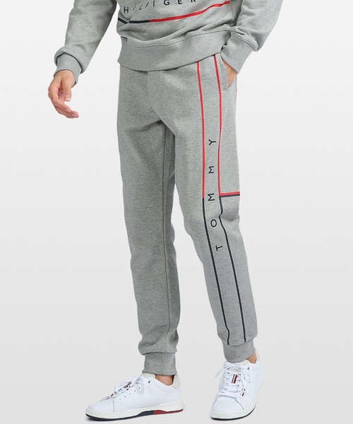 TOMMY HILFIGER(トミーヒルフィガー)の「Clean DNA flag moment Capsule スウェットパンツ(スウェットパンツ・メンズ・ネイビー/グレー/ホワイト・LARGE/MEDIUM/SMALL/X-LARGE)」の1枚目の写真