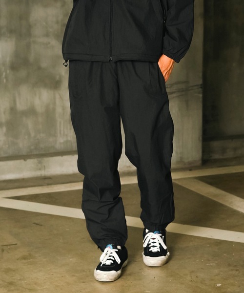 Stars Stripes（スターズストライプス）の「【Stars Stripes/スターズ ストライプス】Water Repellent Lined Track Pants ナイロン トラックパンツ イージーパンツ シルエット調整可能　撥水加工　セットアップ対応可能（その他パンツ・メンズ・クリーム/ブラック/ネイビー・MEDIUM/XX-LARGE/X-LARGE/LARGE/SMALL）」の2枚目の写真