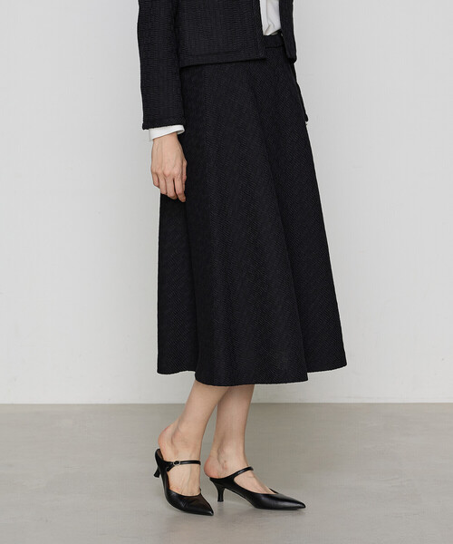 K.T KIYOKO TAKASE(キヨコタカセ)の「【セットアップ対応】ダミエラッセルツイード フレアスカート(スカート・レディース・ライトグレー/ブラック系1・9号/11号)」の2枚目の写真