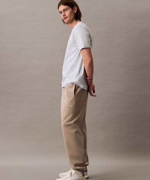 Calvin Klein（カルバン・クライン）の「ダブルニット ジョガーパンツ（スウェットパンツ・メンズ・ベージュ/ブラック・M/S/XS）」の17枚目の写真