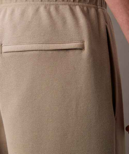 Calvin Klein（カルバン・クライン）の「ダブルニット ジョガーパンツ（スウェットパンツ・メンズ・ベージュ/ブラック・M/S/XS）」の16枚目の写真