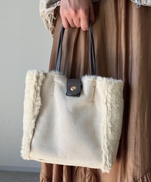 un dix cors | リバーシブルムートン風2WAYバッグ(ハンドバッグ)