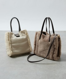 un dix cors | リバーシブルムートン風2WAYバッグ(ハンドバッグ)