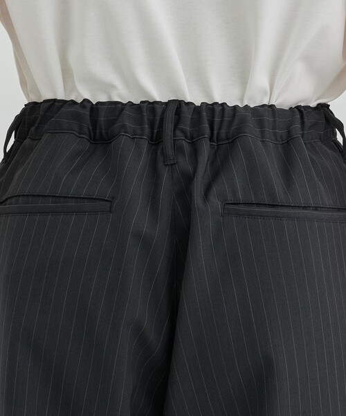 UNITED TOKYO（ユナイテッドトウキョウ）の「SUMMER WOOL パラシュートパンツ（カーゴパンツ・メンズ・ブラック/グレイッシュベージュ・1/2）」の6枚目の写真