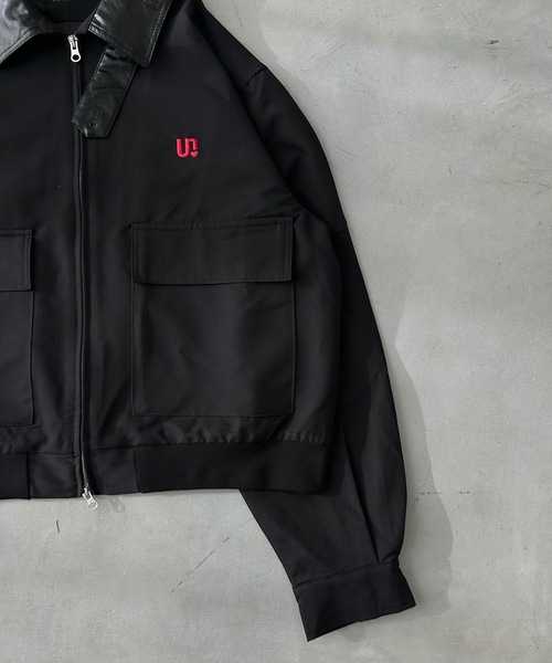 UNDERSTATEMENTs(アンダーステイトメント)の「【ユニセックス】ショート丈レザーカラーユーティリティ刺繍ブルゾン/セットアップ着用可(ブルゾン・メンズ・ブラック系その他/ブラック/ネイビー系・MEDIUM/LARGE)」の6枚目の写真