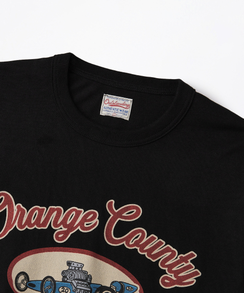 OUTSTANDING（アウトスタンディング）の「MOT SERIES LONG SLEEVE(ORANGE COUNTY)_BLACK（Tシャツ/カットソー・メンズ・その他・X-LARGE/LARGE/MEDIUM）」の3枚目の写真