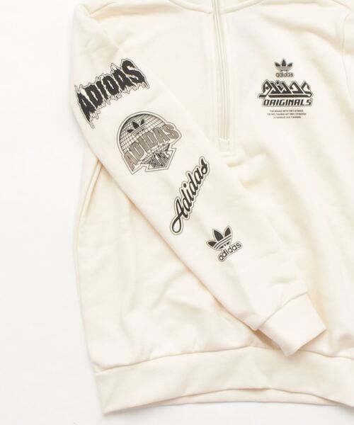 adidas（アディダス）の「グラフィック ハーフジップ スウェット