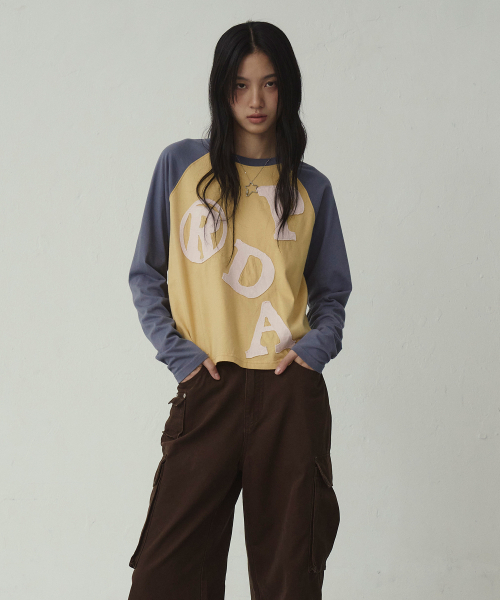 PRENDA(プレンダ)の「PRDA BIG PATCH RAGLAN LONG SLEEVE MUSTARD(Tシャツ/カットソー・レディース・その他・FREE)」の1枚目の写真