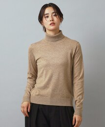 ドレステリアDRESSTERIORベージュ タートルネック ニットワンピース38 DRESSTERIOR（ドレステリア）の「◇フラワードットプリント