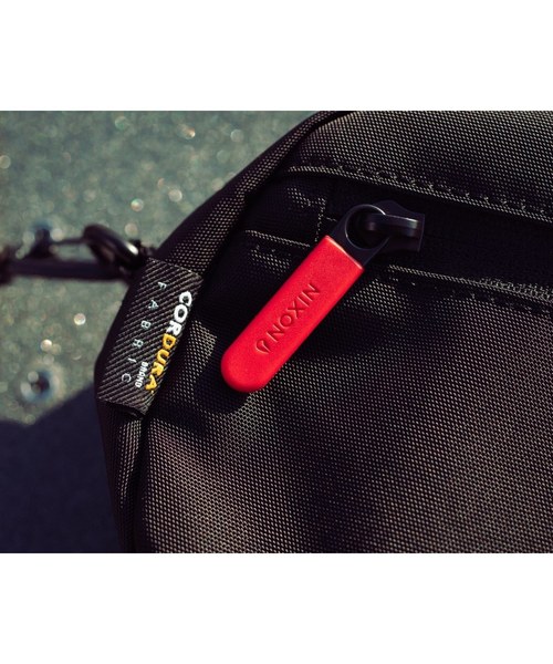 NIXON（ニクソン）の「PETTY SMALL SLING BAG（ショルダーバッグ・レディース・ブラック/カモフラージュ・ONE SIZE）」の10枚目の写真