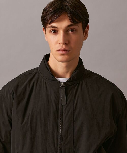 Calvin Klein(カルバン・クライン)の「パデッド ボンバージャケット(ナイロンジャケット・メンズ・グリーン系その他/ブラック・S/L/M/XL)」の3枚目の写真