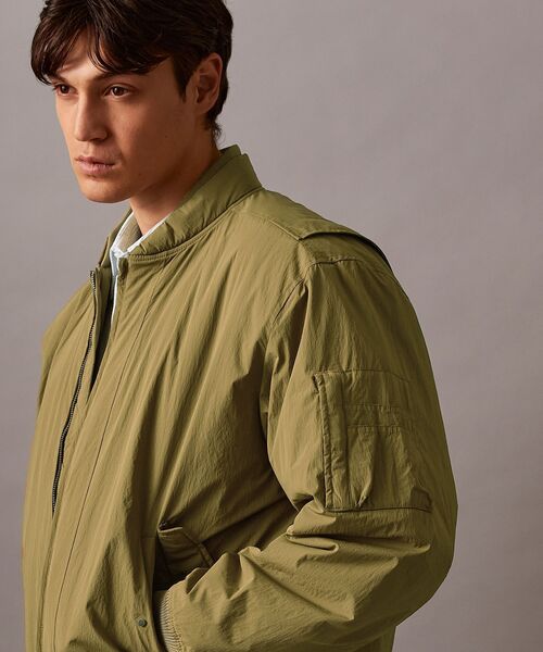 Calvin Klein(カルバン・クライン)の「パデッド ボンバージャケット(ナイロンジャケット・メンズ・グリーン系その他/ブラック・S/L/M/XL)」の5枚目の写真