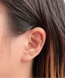 MILLION CARATS（ミリオンカラッツ）の「“耳つぼ×可愛いデザイン”《gargle》で叶えるセルフケア。星や月、ハートリボン、ねこモチーフで楽しむ、毎日に寄り添うアクセサリー。貼るだけ簡単、心も体も整えるおしゃれ耳つぼジュエリー。　＃ハートリボン（イヤーカフ）」