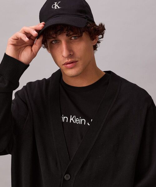 Calvin Klein（カルバン・クライン）の「【ユニセックス】Vネックリラックスコットンカーディガン（カーディガン/ボレロ・メンズ・ブラック/グレー・L/M/S/XL）」の7枚目の写真