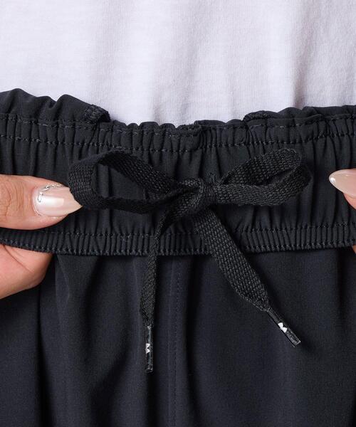 UNDER ARMOUR(アンダーアーマー)の「UAライバル ウーブン ワイド パンツ(ライフスタイル/レディース)(その他パンツ・レディース・ブラック・M/XL/L/S)」の6枚目の写真