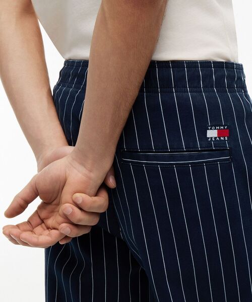 tommy jeans(トミー ジーンズ)の「ストライプ柄パンツ(その他パンツ・メンズ・ネイビー・SMALL/MEDIUM/X-LARGE/LARGE)」の2枚目の写真