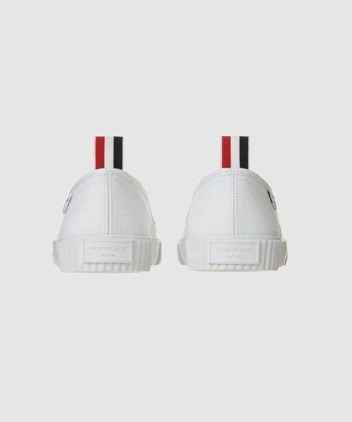 THOM BROWNE(トムブラウン)の「SLIP-ON HERITAGE TRAINER IN CANVAS(スニーカー・メンズ・ホワイト/ネイビー・8.5/9.5/7.5)」の5枚目の写真