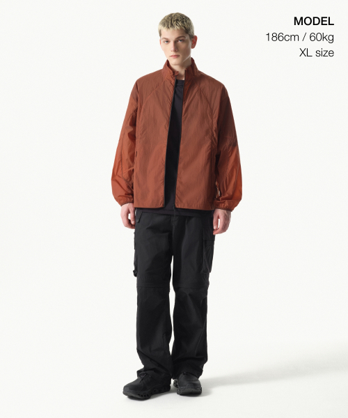 MUSINSA STANDARD（ムシンサスタンダード）の「[シティレジャー] ハイネックシアウィンドブレーカージャケット [オレンジ]（ナイロンジャケット・メンズ・その他・X-LARGE/XX-LARGE/LARGE/MEDIUM/SMALL）」の3枚目の写真
