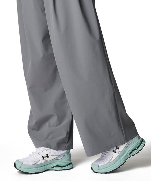 UNDER ARMOUR(アンダーアーマー)の「UAライバル ウーブン ワイド パンツ(ライフスタイル/レディース)(その他パンツ・レディース・イエロー系・L/XL/M/S)」の4枚目の写真