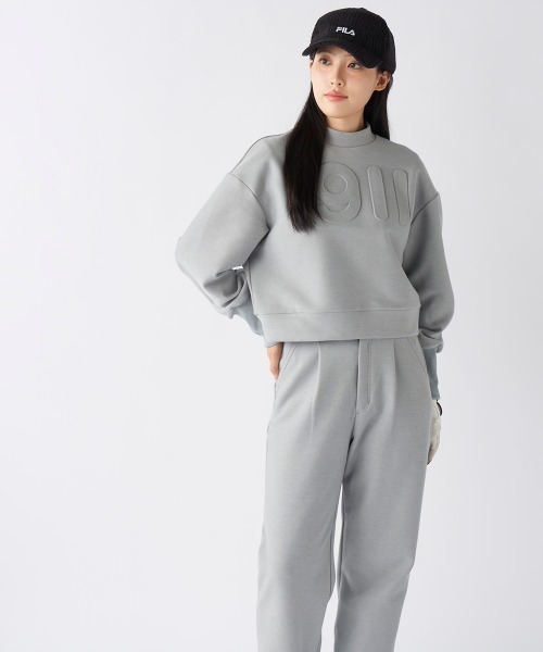 FILA GOLF(フィラゴルフ )の「【FILA GOLF:フィラゴルフ】レディースショート丈ププルオーバースウェット ゴルフ UVカット 保温機能(スウェット・レディース・ブラック/オフホワイト/グレー・MEDIUM/SMALL/LARGE/X-LARGE)」の18枚目の写真