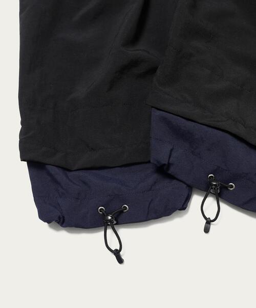 EN ROUTE（アンルート）の「＜EN ROUTE（アンルート）＞ リップストップ レイヤード ヘムコード 1プリーツ（その他パンツ・メンズ・ネイビー/ブラック・3/1/2）」の22枚目の写真