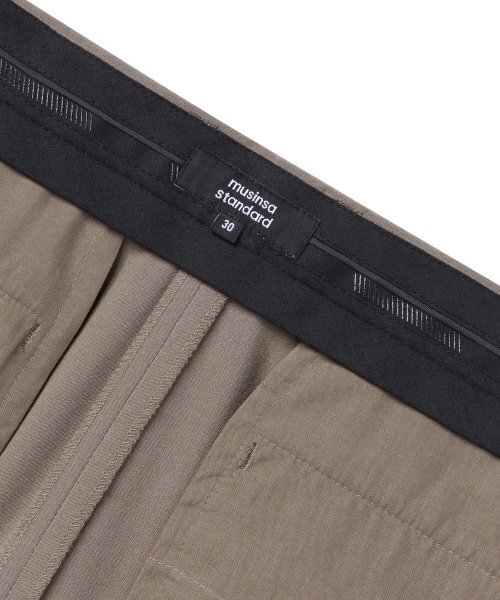 MUSINSA STANDARD（ムシンサスタンダード）の「ライトウェイトスリータックセミバルーンスラックス[ダスティベージュ]（スラックス・メンズ・その他・38/42/26/27/28/29）」の6枚目の写真