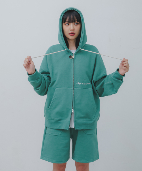 BAKKEN（バッケン）の「スマイル刺繍ロゴ2WAYボタンフードジップアップBK7985_グリーン（パーカー・メンズ・グリーン・FREE）」の3枚目の写真