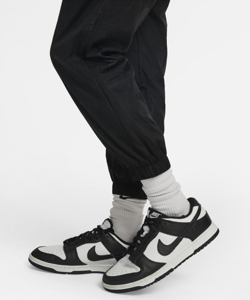 【新品タグ付】emmi 【NIKE】ミッドライズ　パンツ　ブラック NIKE】ウィメンズ ミッドライズ レペル アシンメトリカル