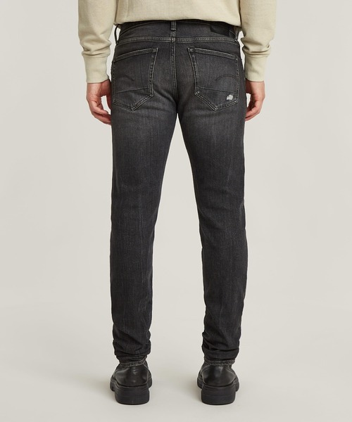G-STAR(ジースター)の「3301 SLIM JEANS/ヴィンテージライクベーシックスリムテーパードジーンズ/ダメージ加工(デニムパンツ・メンズ・ブラック系その他・28/30/29/30/30/30/31/30/32/30/33/30/34/30/36/30/30/32/34/32/33/32/32/32/36/32)」の2枚目の写真