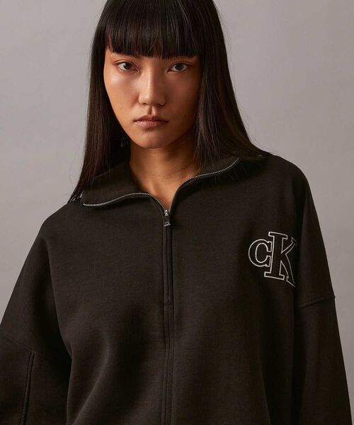 Calvin Klein(カルバン・クライン)の「ロングスリーブ ハーフジッププルオーバー(ブルゾン・レディース・オフホワイト/ブラック/グレー・S/XS/XXS)」の5枚目の写真