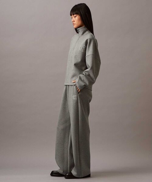 Calvin Klein(カルバン・クライン)の「ロングスリーブ ハーフジッププルオーバー(ブルゾン・レディース・オフホワイト/ブラック/グレー・S/XS/XXS)」の10枚目の写真