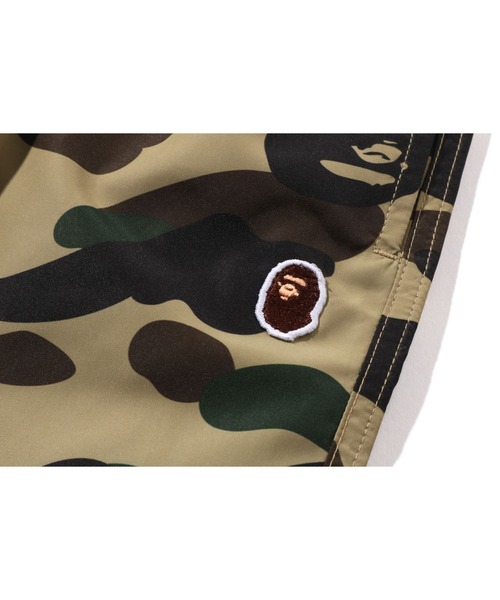 A BATHING APE（アベイシングエイプ）の「1ST CAMO ONE POINT BEACH SHORTS（その他パンツ・キッズ・グリーン/イエロー・100/90/120/110/140/130）」の5枚目の写真