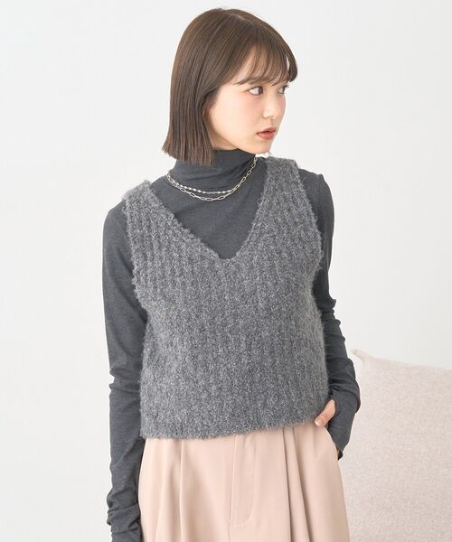 earth music&ecology（アースミュージックアンドエコロジー）の「MIXカラーブークレニットビスチェ（ベスト・レディース・オレンジ系その他/ベージュ/ライトブルー/チャコールグレー・F）」の6枚目の写真