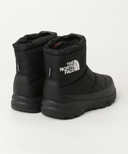 THE NORTH FACE（ザノースフェイス）の「ザ ノース フェイス THE NORTH FACE ヌプシ ブーティ ウォータープルーフ ロゴ ショート アークティック グリップ（ブーツ・メンズ・ブラック・23.0cm/25.0cm/26.0cm/27.0cm/28.0cm/24.0cm）」の2枚目の写真