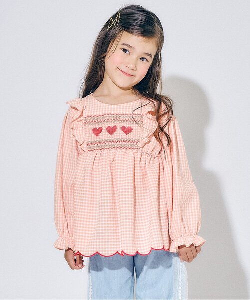 Seraph(セラフ)の「ハートスモッキングチュニックブラウス_ジュニア対応(シャツ/ブラウス・キッズ・オフホワイト/ピンク・80/120/110/100/90/140/130)」の1枚目の写真