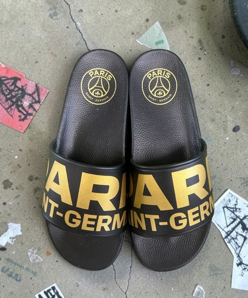 PARIS SAINT-GERMAIN(パリサンジェルマン)の「Paris Saint-Germain シャワーサンダル_BK×GD・XL(サンダル・レディース・ブラック×ゴールド・XL)」の1枚目の写真