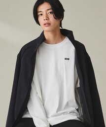 AIGLE（エーグル）の「オーガニックコットン オーバーサイズ ワンポイントシリコンバッジロゴ ロングスリーブTシャツ（Tシャツ/カットソー）」