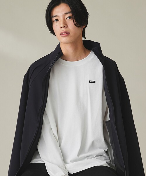 AIGLE（エーグル）の「オーガニックコットン オーバーサイズ ワンポイントシリコンバッジロゴ ロングスリーブTシャツ（Tシャツ/カットソー・メンズ・ブラック/ダークグレー/ホワイト・L/M/S/XL/XS/XXS）」の2枚目の写真