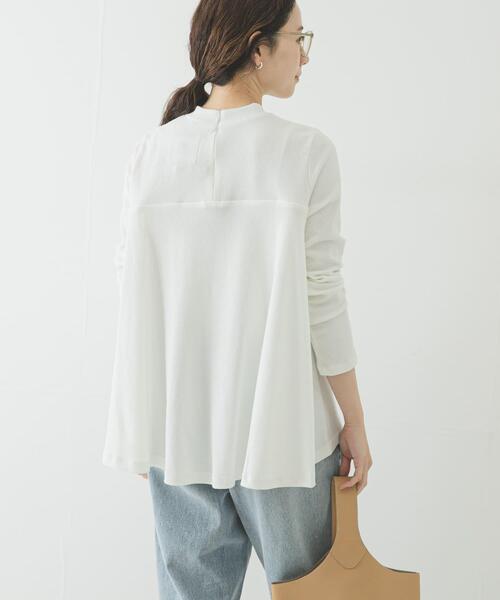 NEW BALANCE(ニューバランス)の「NEW BALANCE NB GREYペプラム長袖トップ(Tシャツ/カットソー・レディース・ベージュ/オフホワイト・MEDIUM)」の5枚目の写真