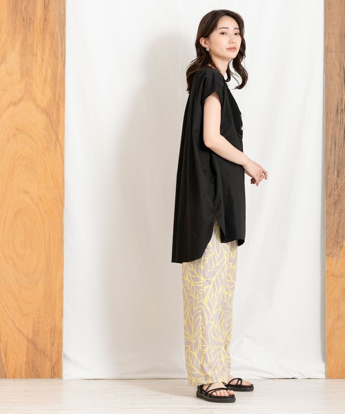 Torrazzo Donna（トラッゾドンナ）の「パール付ニットシャツ