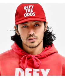 EXTRAORDINARY（エクストラオーディナリー）の「DEFY THE ODDS CAMP CAP RED（キャップ）」