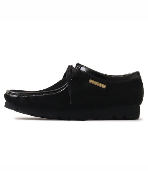 Clarks(クラークス)の「Clarks Wallabee Black Hair On BLACK EYE PATCH atmos / クラークス ワラビー ブラック ヘア オン ブラックアイパッチ アトモス【SP】(ブーツ・メンズ・ブラック・23.5cm/24.0cm/24.5cm/25.0cm/25.5cm/27.5cm/28.0cm/28.5cm/29.0cm)」の1枚目の写真
