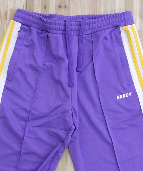 NERDY（ノルディ）の「NERDY ブロックトラックパンツ NY Block Track Pants（スウェットパンツ・メンズ・パープル・M）」の3枚目の写真