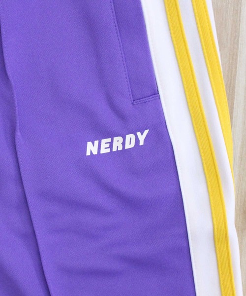 NERDY（ノルディ）の「NERDY ブロックトラックパンツ NY Block Track Pants（スウェットパンツ・メンズ・パープル・M）」の4枚目の写真