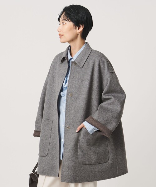 UNITED ARROWS(ユナイテッドアローズ)の「バイカラー リバー ステンカラー コート(ステンカラーコート・レディース・その他1/オフホワイト/ネイビー・36/38)」の6枚目の写真