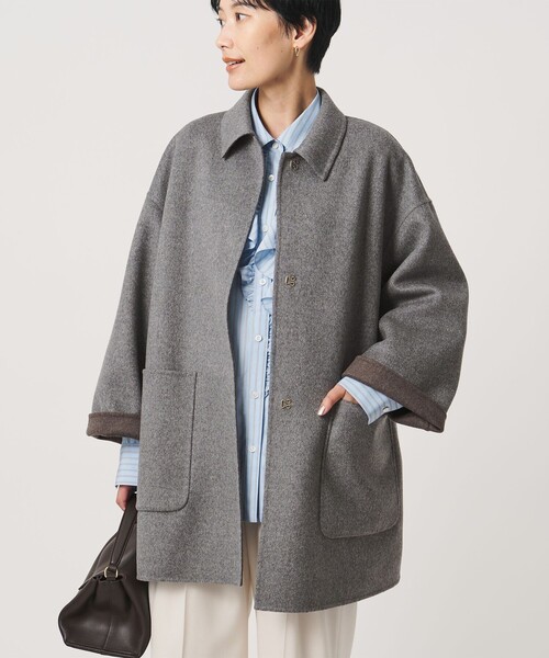 UNITED ARROWS(ユナイテッドアローズ)の「バイカラー リバー ステンカラー コート(ステンカラーコート・レディース・その他1/オフホワイト/ネイビー・36/38)」の7枚目の写真
