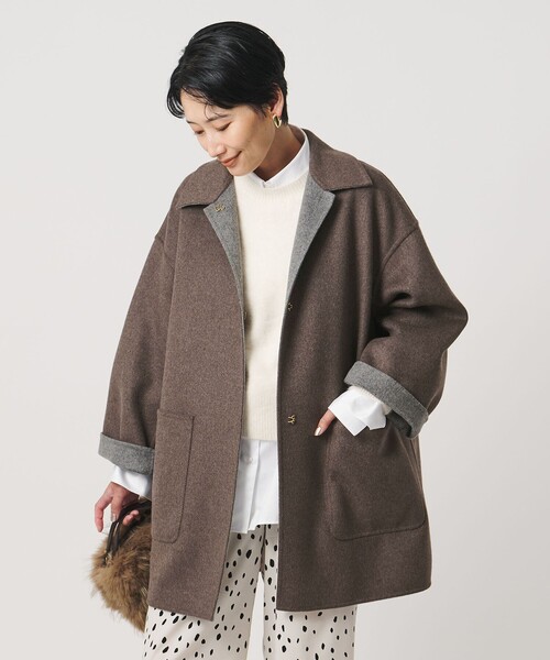 UNITED ARROWS(ユナイテッドアローズ)の「バイカラー リバー ステンカラー コート(ステンカラーコート・レディース・その他1/オフホワイト/ネイビー・36/38)」の9枚目の写真