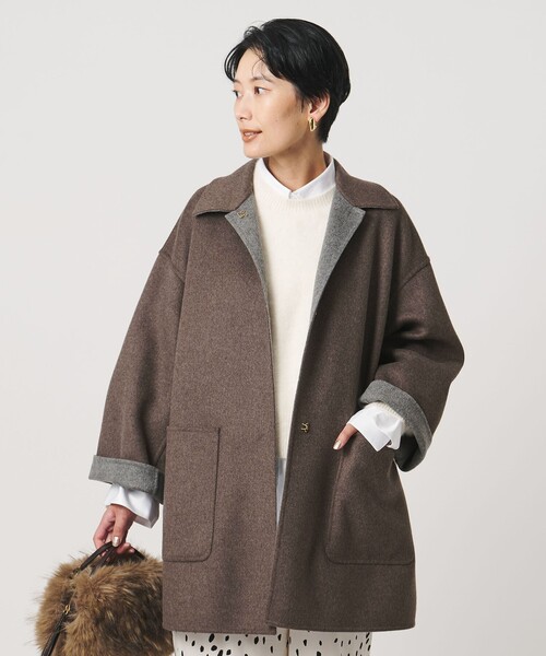 UNITED ARROWS(ユナイテッドアローズ)の「バイカラー リバー ステンカラー コート(ステンカラーコート・レディース・その他1/オフホワイト/ネイビー・36/38)」の11枚目の写真