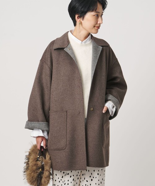 UNITED ARROWS(ユナイテッドアローズ)の「バイカラー リバー ステンカラー コート(ステンカラーコート・レディース・その他1/オフホワイト/ネイビー・36/38)」の12枚目の写真